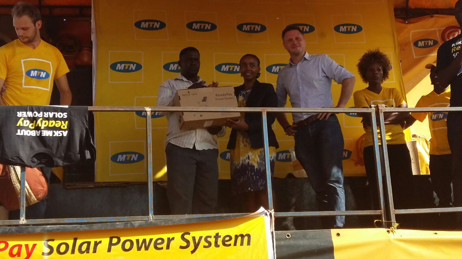 MTN’s CMO Mapula Bodibe handing over a full ReadyPay Solar Kit to one of the winners from the draw that was conducted at the launch in Luwero-Kasana.