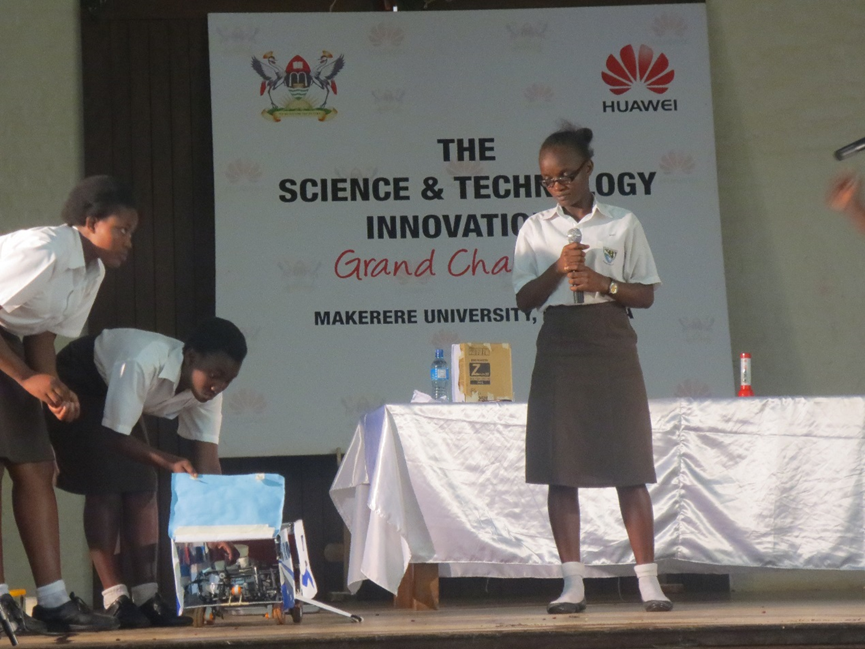 College Girls operating a Robot in the Science Technology and Innovation Challenge, an initiative of Ilabs Makerere University that Huawei has sponsored in a drive to promote innovation.