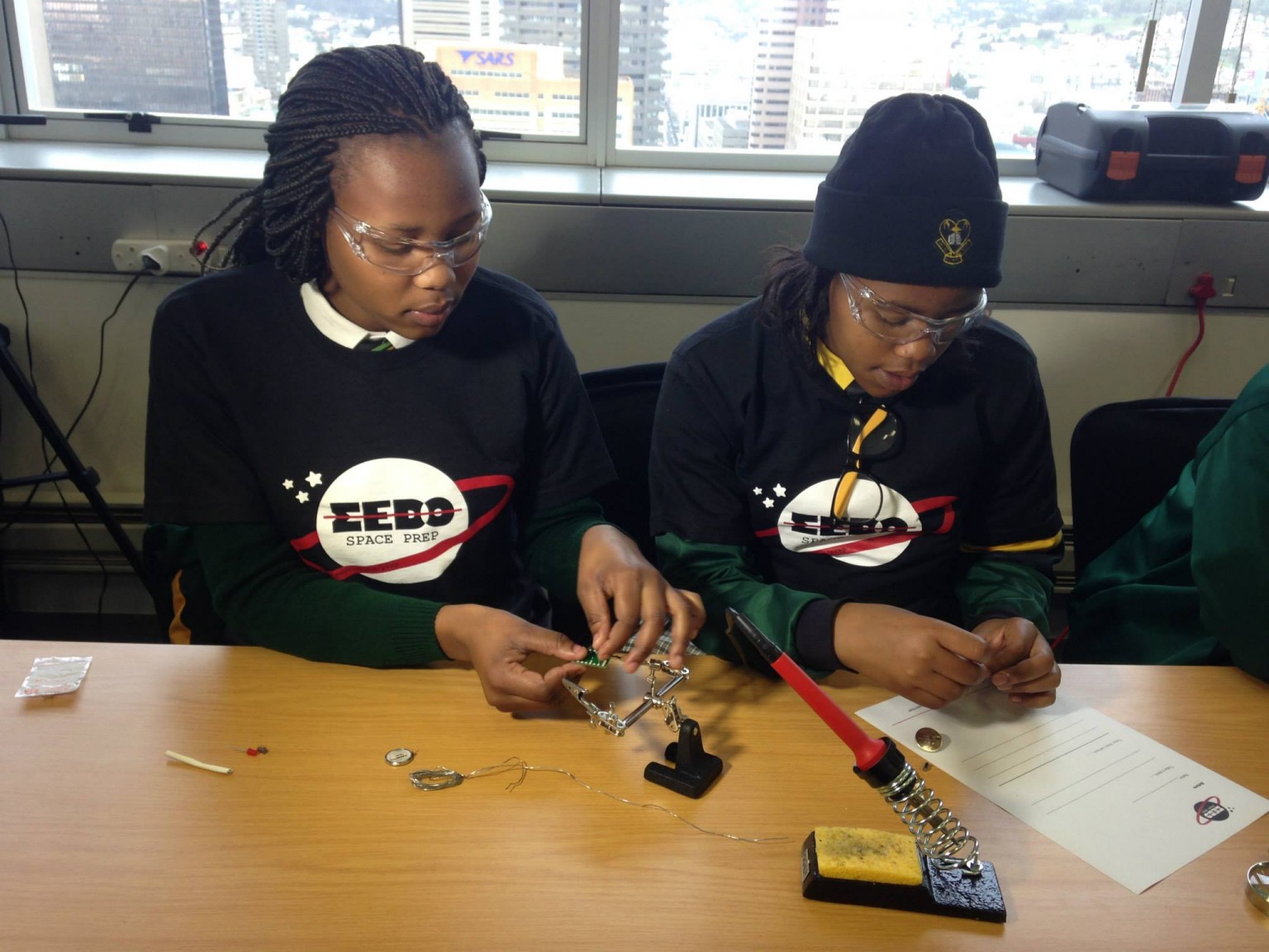 Photo of Africa’s first private satellite created by three South African teenage girls
