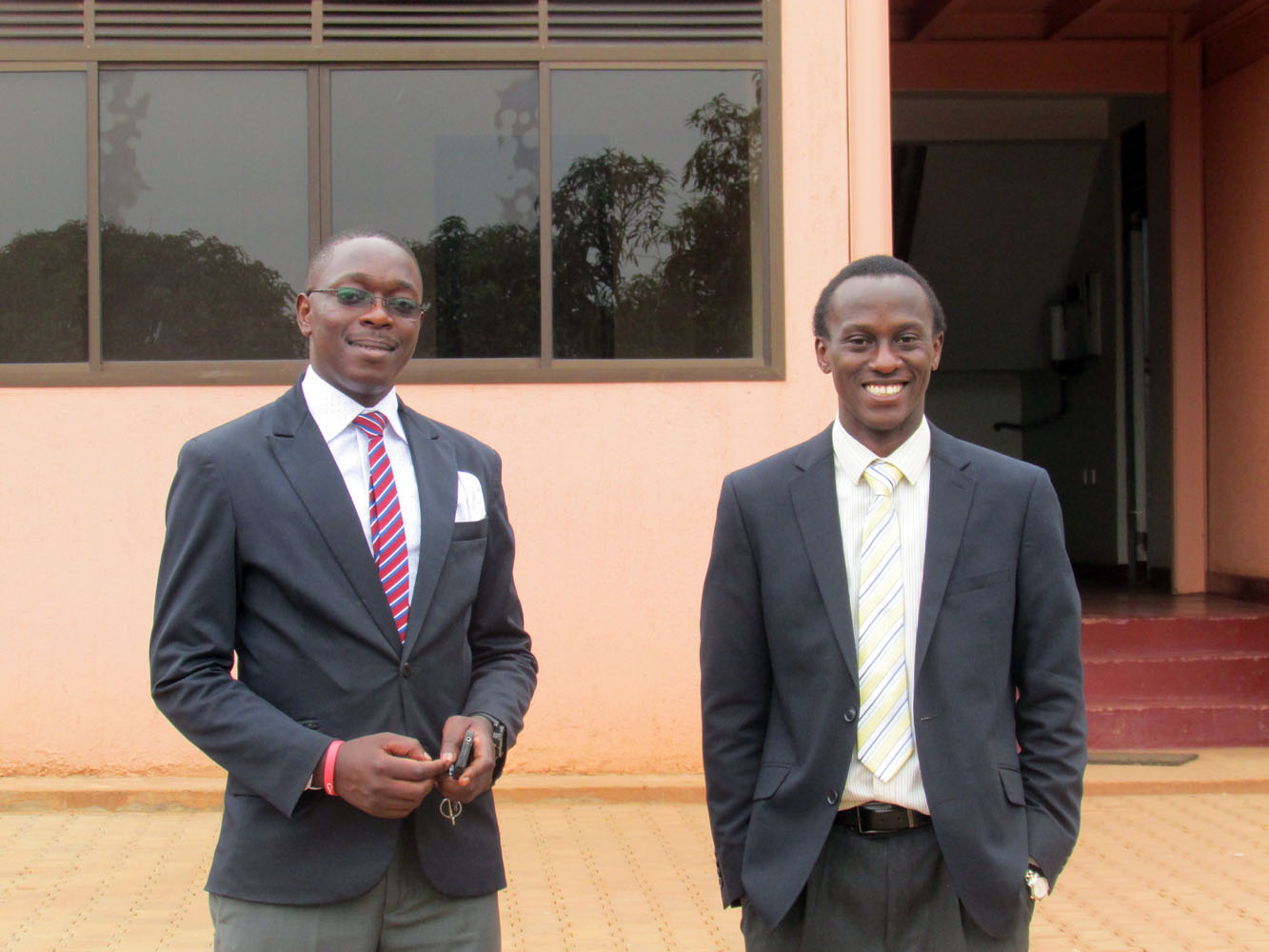 Patrick Kadama (R), Service Delivery Partner and James Walusimbi, (L) IBP Systems Integrator