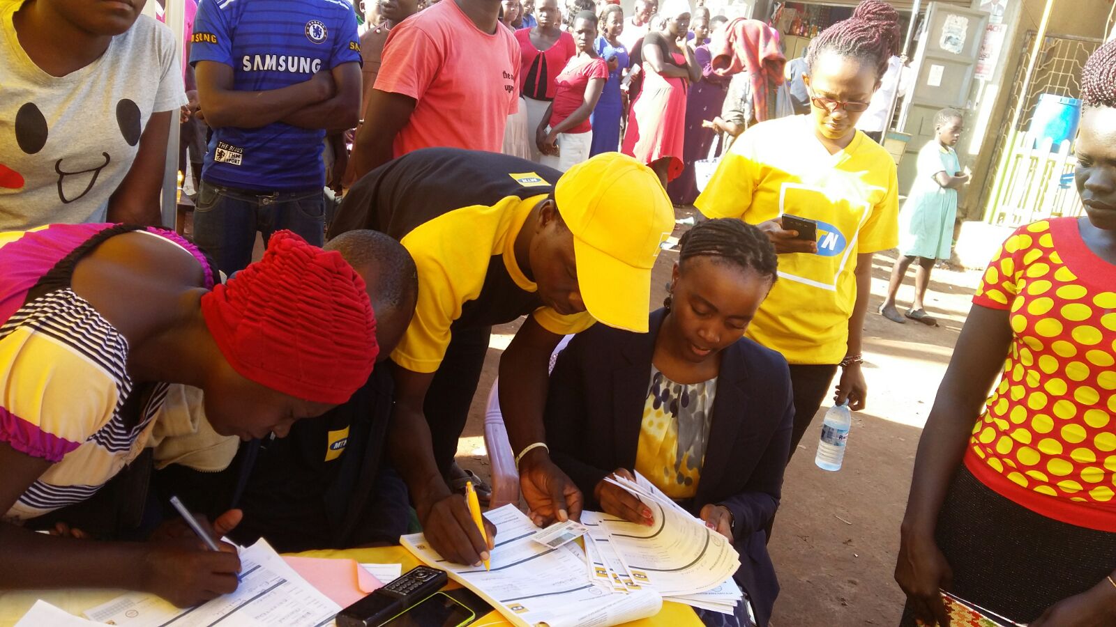 MTN’s CMO Mapula Bodibe personally verifies registered customers in Luwero Kasana after the launch of ReadyPay Solar system in partnership with Fenix International.