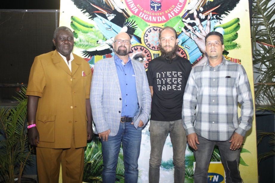 MTN Uganda Chief Marketing Officer; Olivier Prentout (2nd from left) poses with Derek Debru; Co-Founder of Nyege Nyege (black t-shirt), Uganda Tourism Board Executive Director; Steven Asiimwe (extreme left), and ; Talent Africa CEO (extreme right) at the MTN Nyege Nyege Festival launch at The Square Palace on Wednesday 21st, Feb 2018.