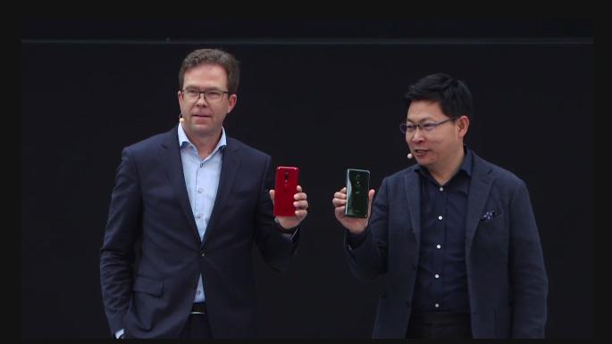 Dr. Jan Becker (L) CEO at Porsche Design and Richard Yu (R) CEO at Huawei Consumer Business Group pose with the new Huawei P20 and P20 Pro during their launch in Paris, France on Tuesday 27th March, 2018 | Photo Credit : PC Tech Magazine/Olupot Nathan Ernest.