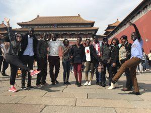 The 10 finalists for the 2018 Huawei's seeds for future programs pose for a group photo infront of the Forbidden City, also known as the Palace Museum, in Beijing which is also the biggest preserved palace in the world.