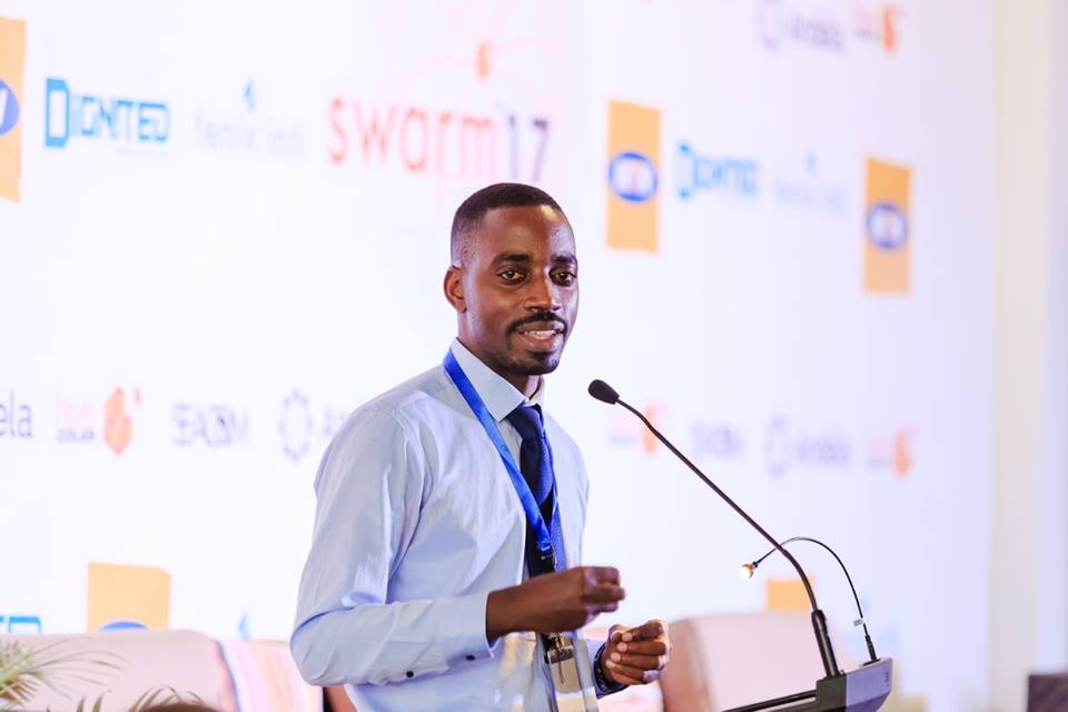 ICTAU Chairman; Albert Mucunguzi keynotes during the 2017 SWARM event organized by Hive Colab at The Square Palace in Kampala, Uganda. (Photo Courtesy: Hive Colab)