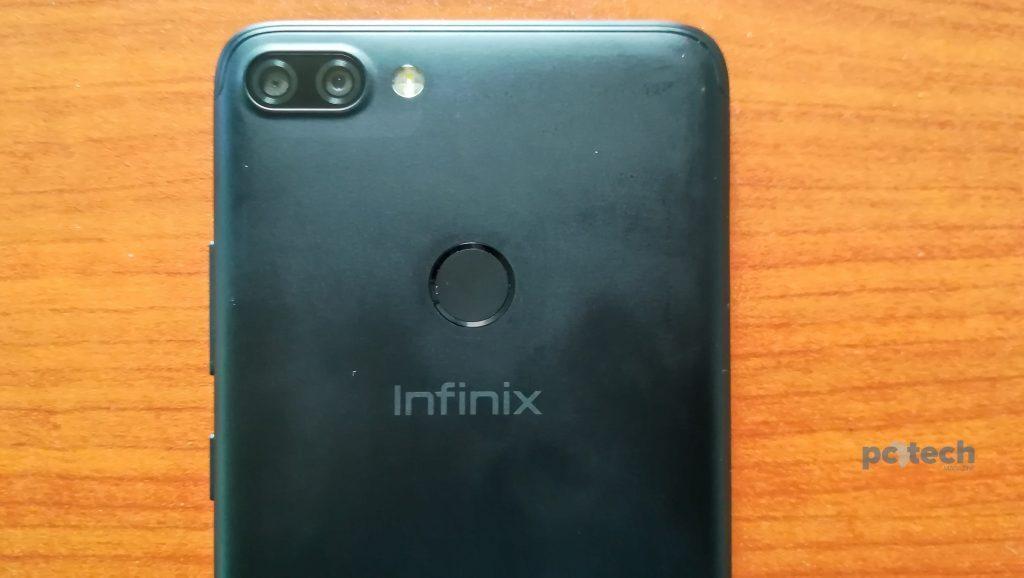 The fingerprint sensor of the Infinix Hot 6 Pro appears at the back, just below the dual rear camera.