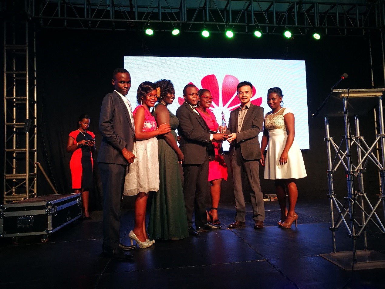 M-VOUCHER Team receiving an ICT for Development Award from the former Managing Director of Huawei Uganda Mr. Stanley Chyn at the UCC ACIA Awards 2017.