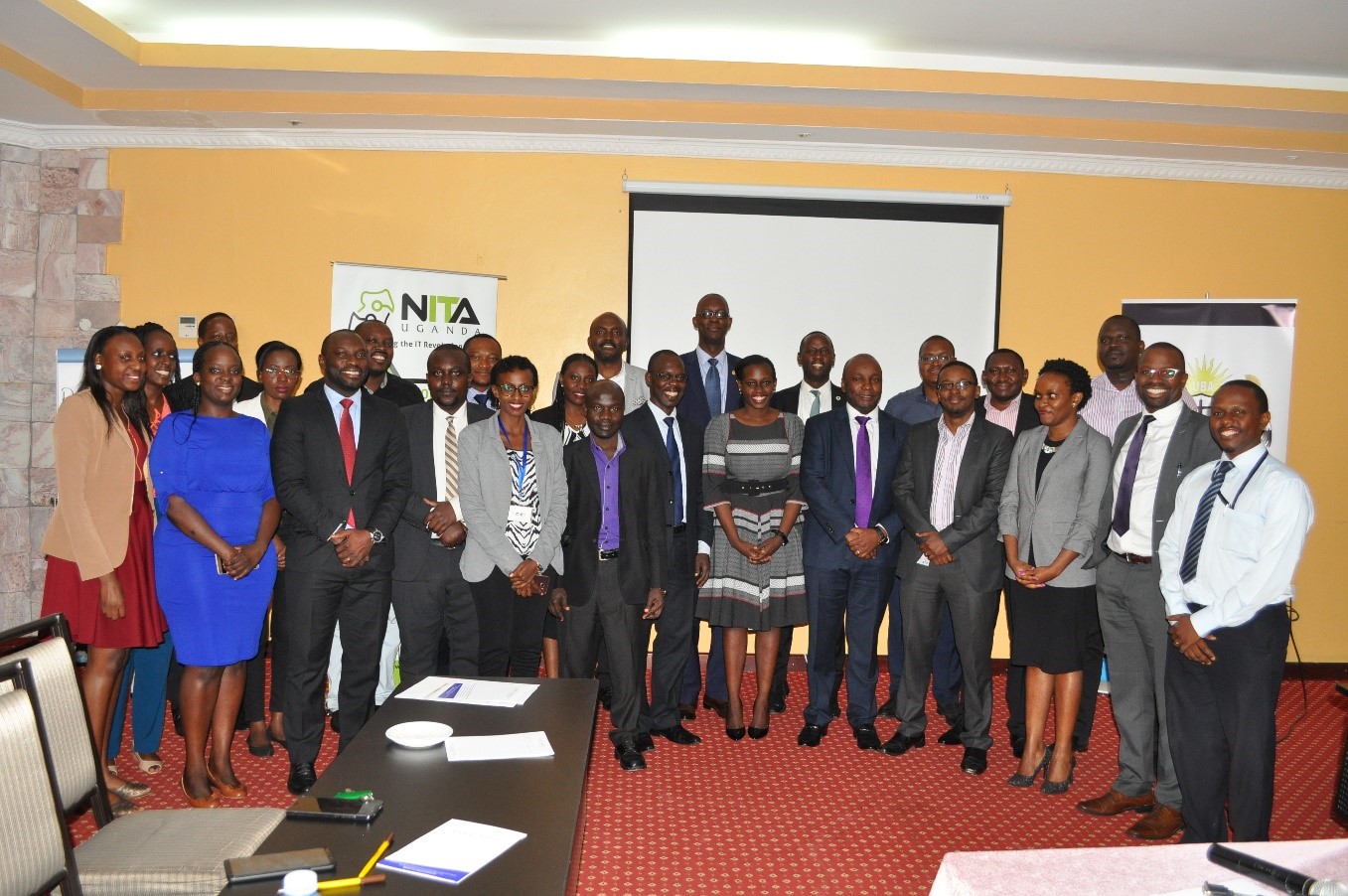Uganda Bankers Association and NITA-U Officials pose for a picture.