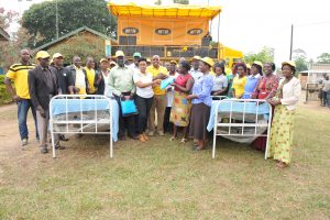 Oriajin Hospital officials receive hospital equipment from MTN Foundation. Senior Manager for Corporate Affairs, Justina Ntabgoba officially handed over the items.