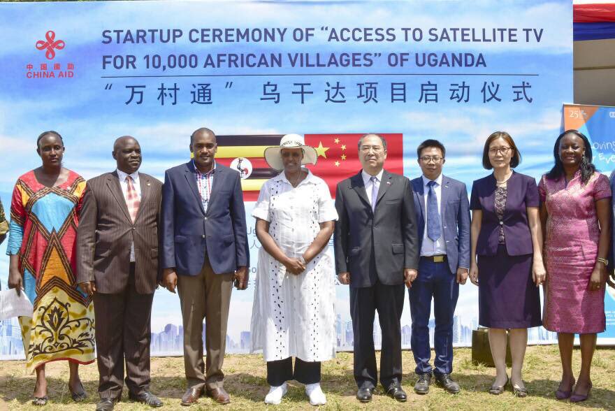 First Lady & Minister of Education and Sports; Hon. Janet Museveni (in a hat), Minister of ICT and National Guidance; Hon. Frank Tumwebaze (3rd from left), and the Chinese ambassador to Uganda; Zheng Zhuqiang (4th from right), pose for a group photo with other members of the Satellite TV Project during the launch in Wakiso on Friday 20th July, 2018. (Photo Courtesy: GCIC Uganda)