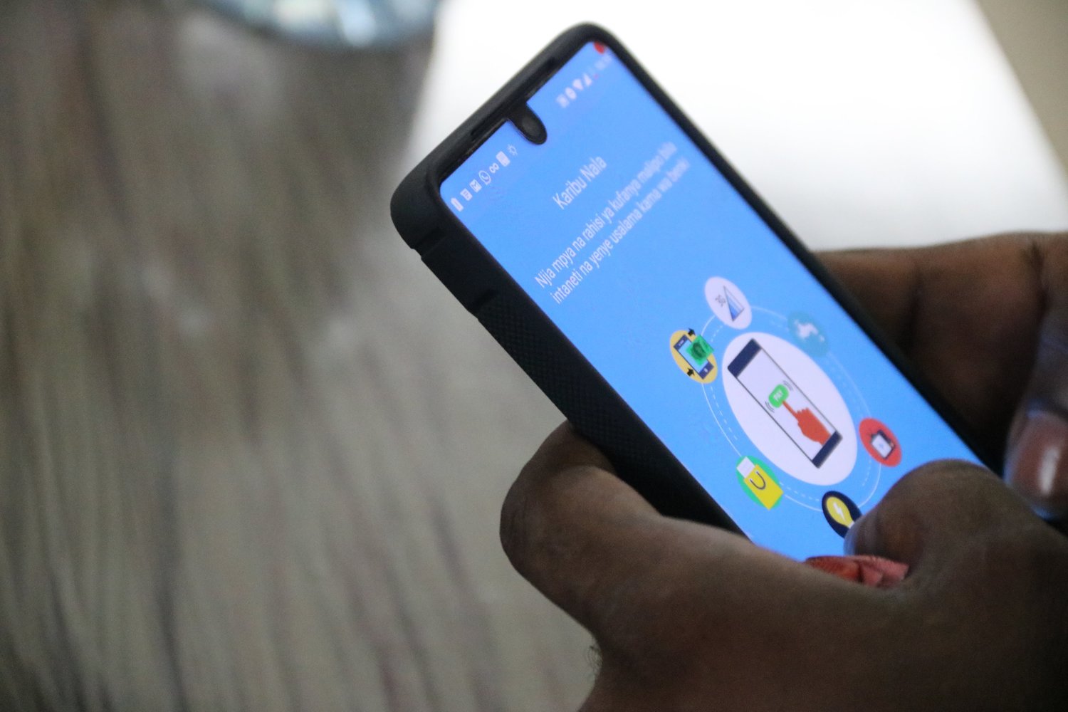 Tanzania's Fintech startup; NALA, emerged finalists in the 2018 Ecobank Fintech Challenge. Pictured is a user using the Nala solution app. (Photo Credit: Nala)