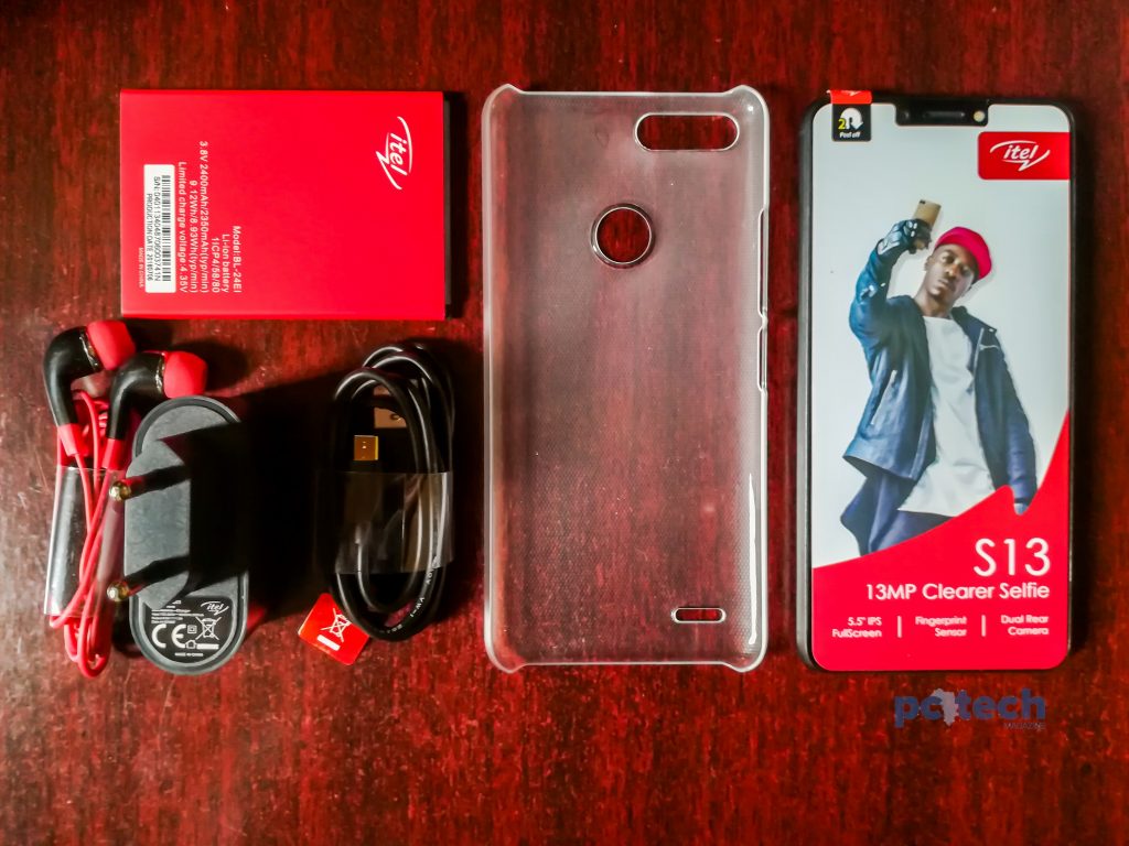 In side the box comes the itel S13 handset in a color unit of your choice, a removable 24000mAh Li-lon battery, a charging brick, a pair of red and black earphones, a USB data cable and charging chord.