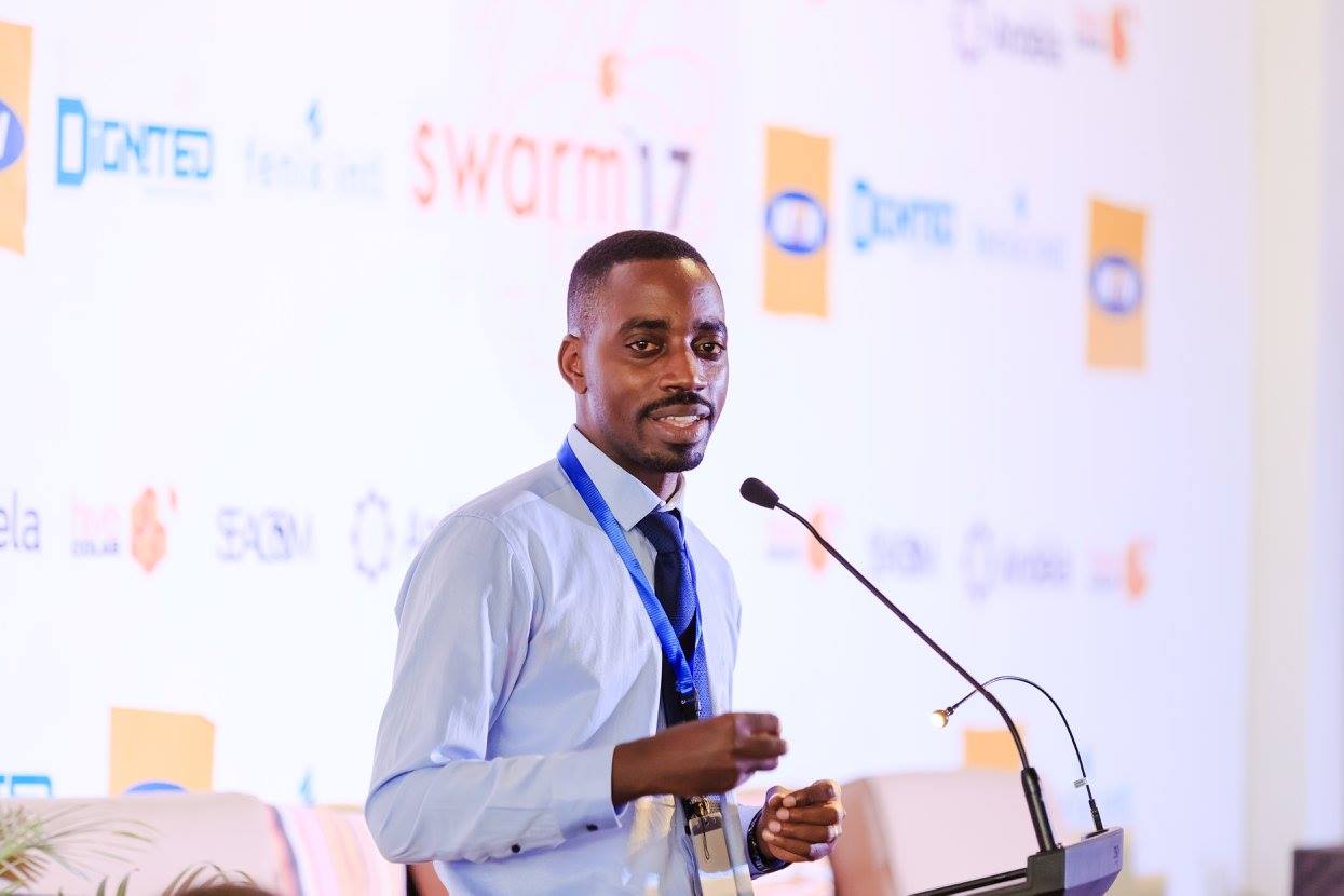ICTAU Board Chairman, Albert Mucunguzi speaking at the second edition of swarm summit. File Photo