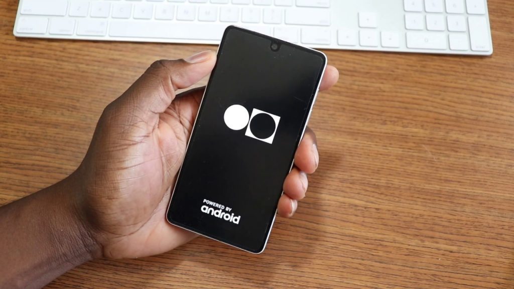 A man pictured displaying the Essential Phone. It is an Android smartphone designed by Android co-founder Andy Rubin and is the first notched display smartphone as well | YouTube Images.