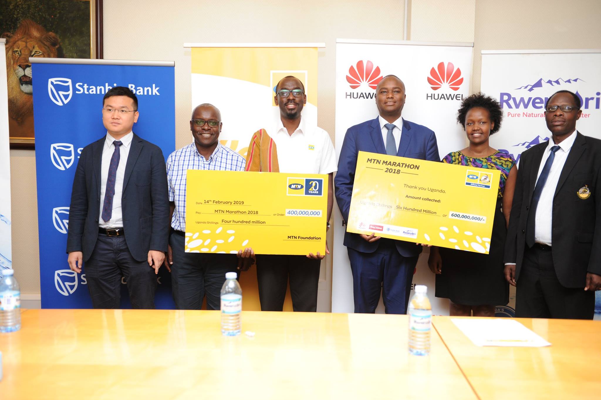 MTN Marathon partners pose for a group photo after briefing the media at a press conference held at Stanbic Uganda HQ at Crested Towers in Kampala on Thursday 14th, February 2018.