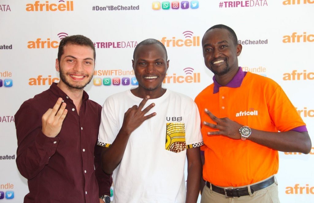 Mohammad Yahfoufi (left) poses for a picture with Uber Country Manager Aaron Tindiseega (center) and Africell Public Relations Manager Edgar Karamagi (right) during the launch of the Triple Data campaign at the Africell Uganda head offices. Courtesy Photo.