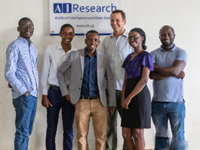 Makerere University AirQo research team pose for a group picture at their research lab. File Photo.