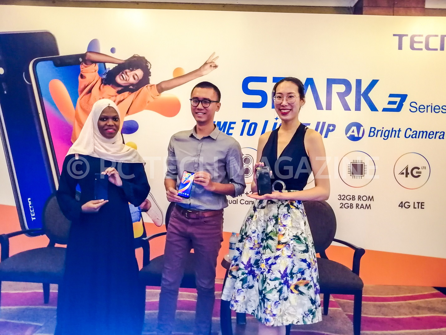 In Pictorial (L-R): Kantinti Huddah; Tecno Uganda Products Consultant, Shiva; Tecno Uganda Brands Manager, and Gladys Liu; Tecno Uganda Marketing Manager pose for a group photo with holding the TECNO Spark 3 and Spark 3 Pro at their launch at the Sheraton Hotel in Kampala, Uganda on Monday May, 6th 2019. Photo by Olupot Nathan Ernest/PC TECH MAGAZINE.