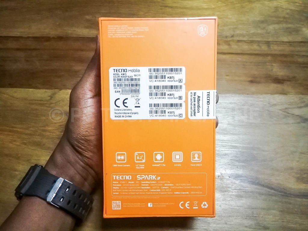 Tecno Spark 3 displayed with its seal still intact.