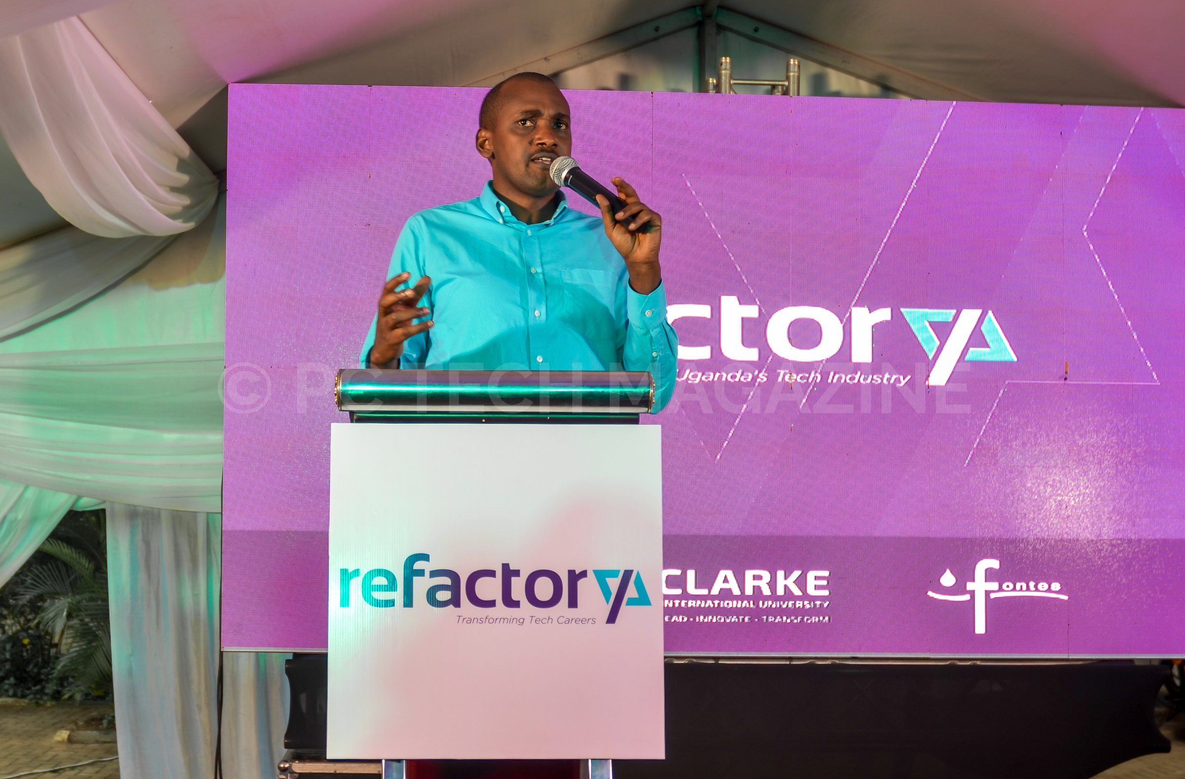 Minister of ICT and National Guidance, Hon. Frank Tumwebaze speaking at the launch of the Refactory Program at Clarke International University on Wednesday 13th, June 2019.