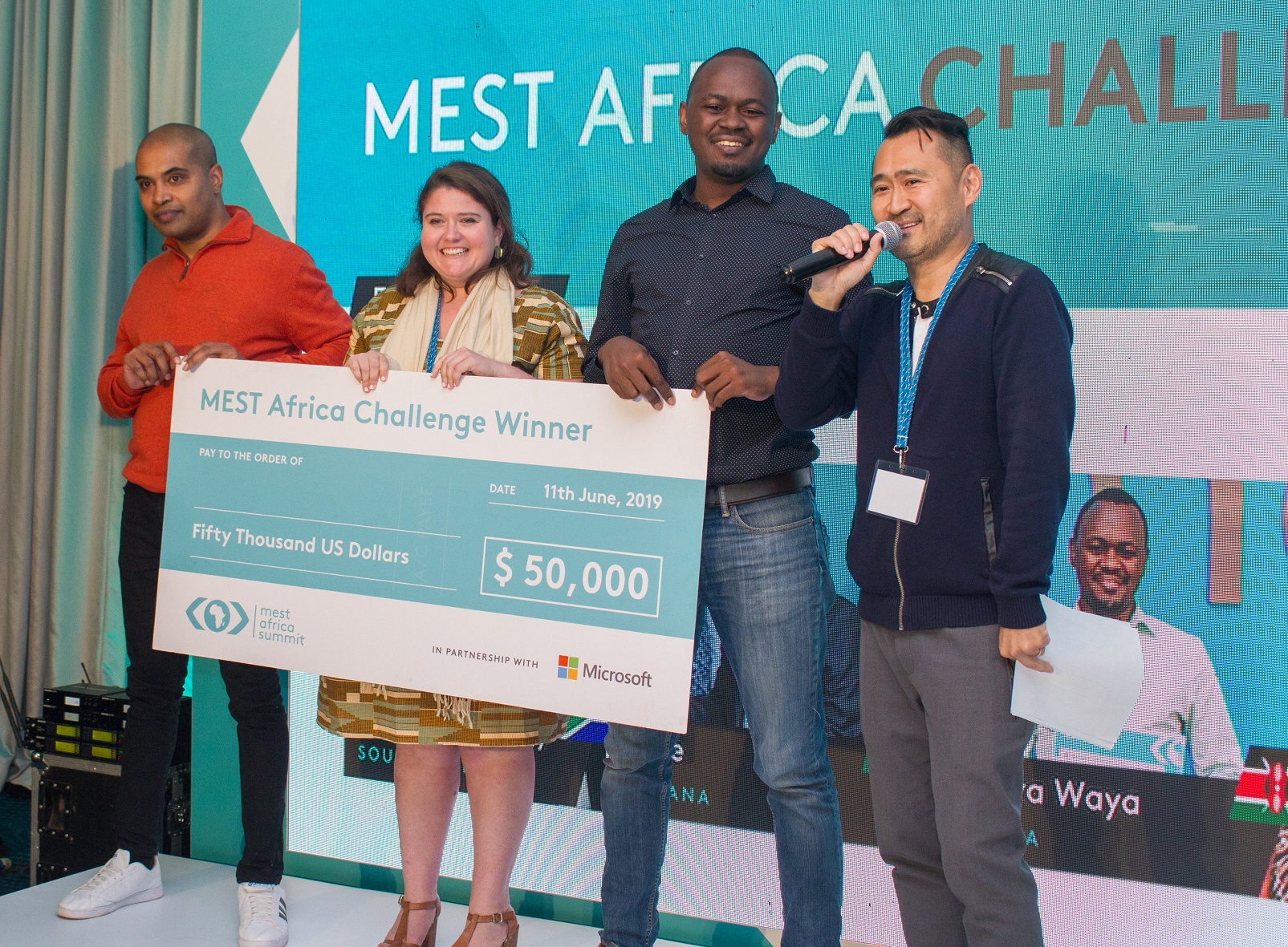 One of the winners of the 2019 MEST Africa Challenge receiving her dummy cheque of USD$50,000 during the MEST Africa Summit in Nairobi, Kenya on Thursday 13th, June 2019.