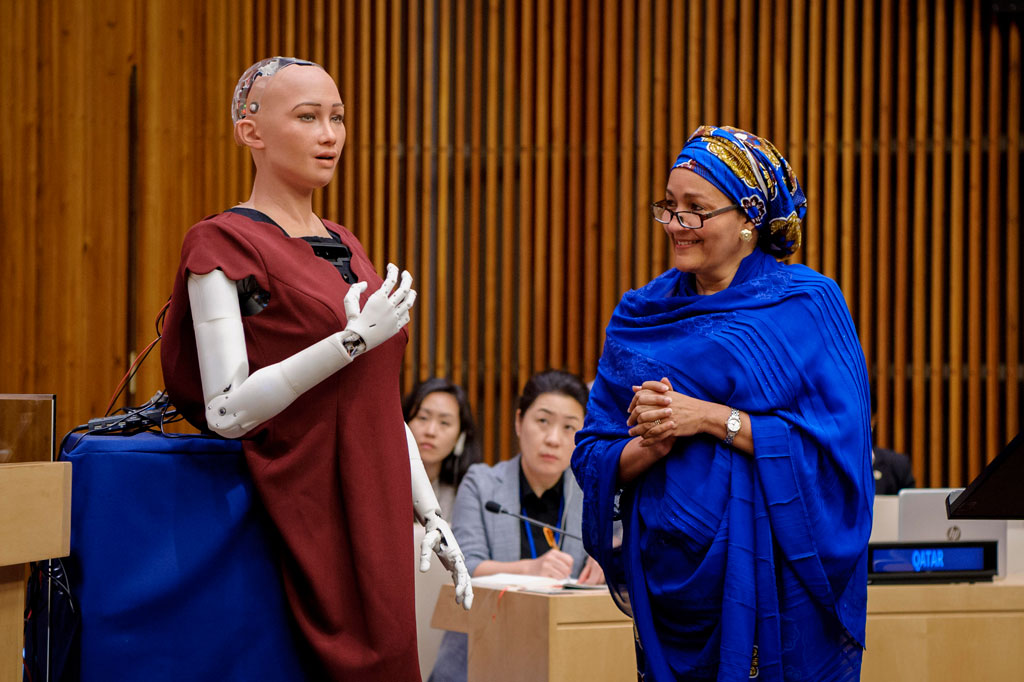 Deputy UN Secretary-General Amina Mohammed (R) interacts with Sophia the robot at a Creative Industry Summit in Egypt. File Photo