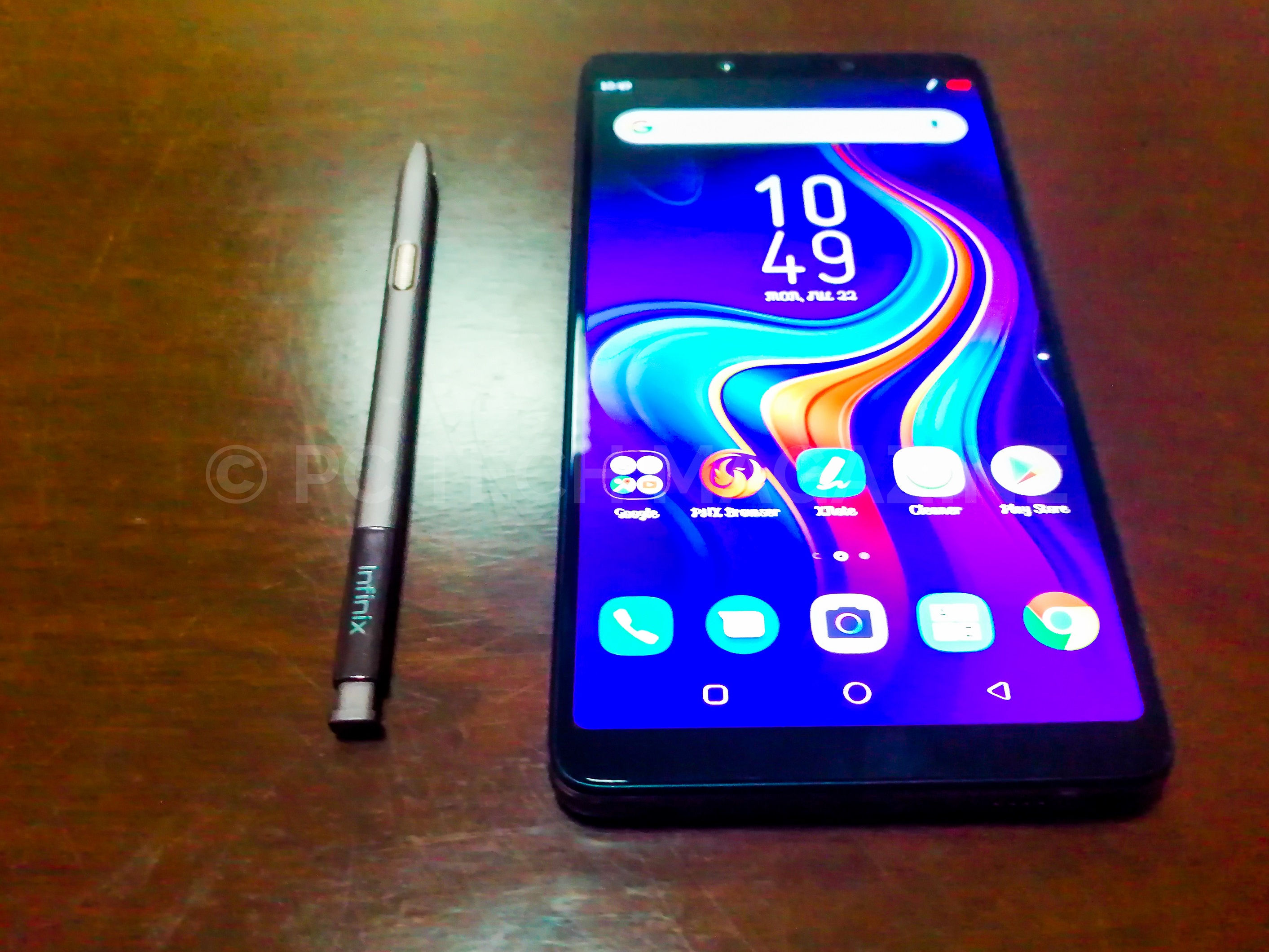 The Infinix Note 6 with its X Pen pictured besides it.