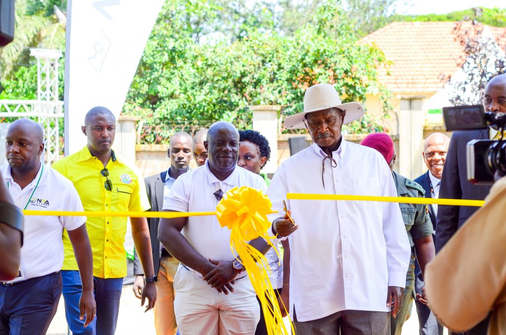 President Yoweri Museveni cutting the ribbon officially launching the National Tier 3 Data Center in Jinja on Thursday June, 12th 2019.