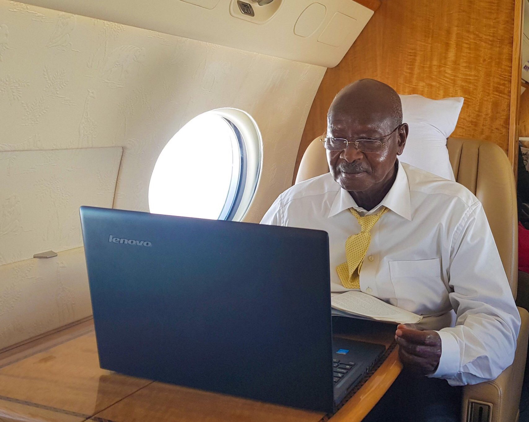 Ugandans take to Twitter to imitate President Museveni who was pictured in his plane with a lenovo laptop. Courtesy Photo/ President Museveni