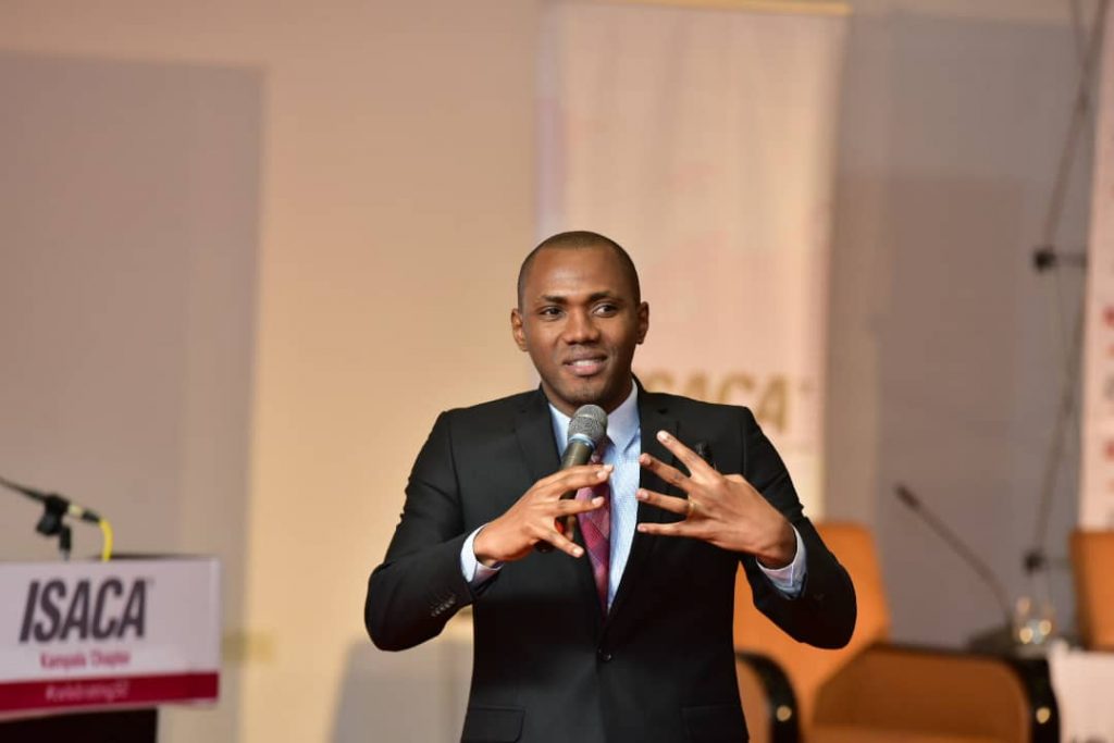 Peter Ojekunle; Manager IT Risks Assurance at PwC Uganda sharing insights on artificial intelligence & continuous auditing at the ISACA Information Security Conference in Kampala.