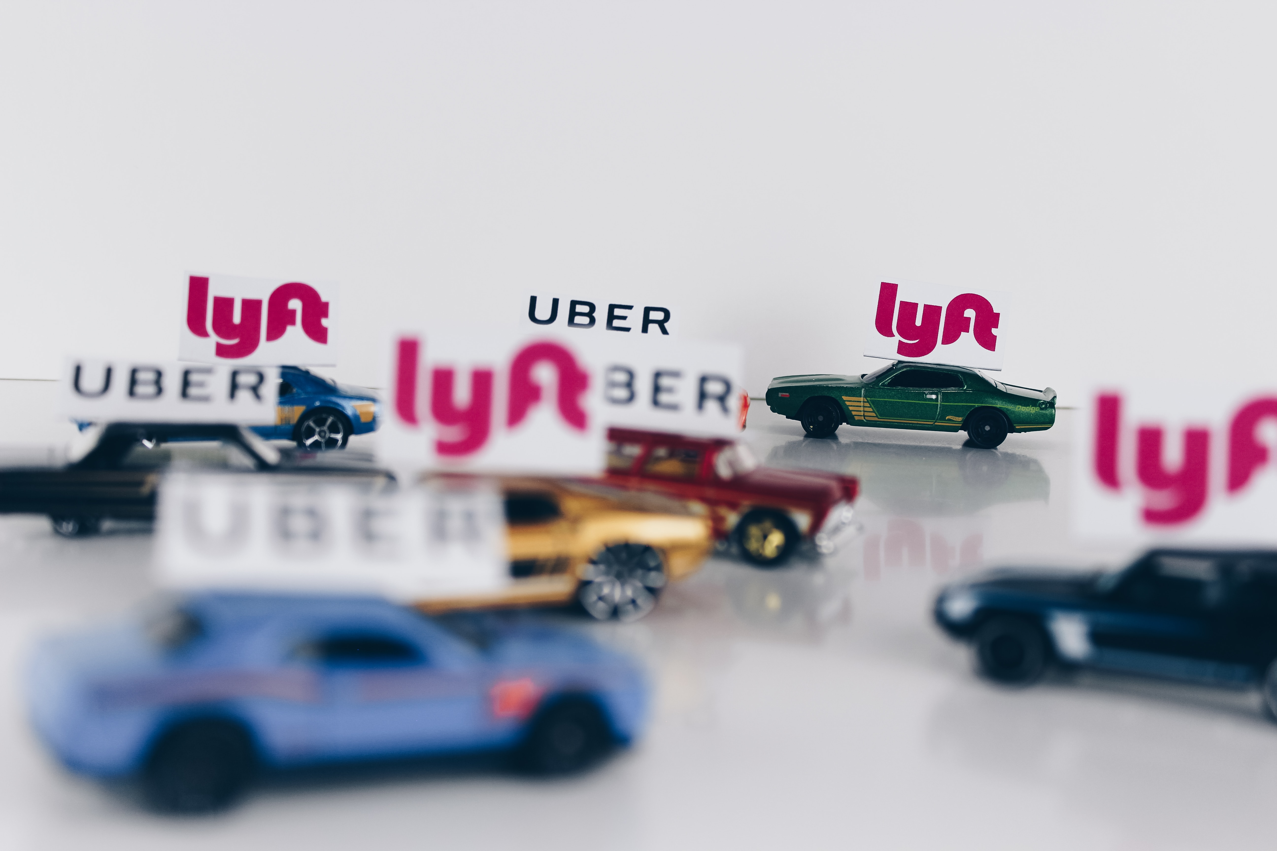 Uber and Lyft are U.S. based ride sharing companies. Photo by Thought Catalog on Unsplash