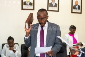 Mr. John R. Musinguzi swearing in as the new Chairperson for the Board of Directors of NITA-U at the swearing ceremony at the Ministry of ICT offices in Kampala on Thursday 19th, September 2019. (PHOTO; Olupot Nathan Ernest/PC Tech Magazine)