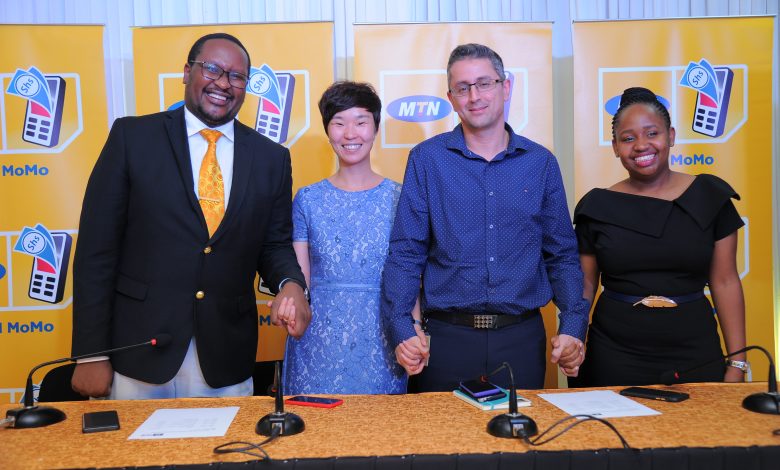 The various representatives after launching the money remittance platform between MTN Uganda and Vodacom Tanzania on Tuesday 25th, Feb. 2020. File Photo