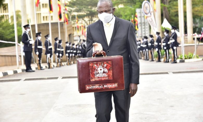 Minister of Finance; Hon. Matia Kasaija delivering the FY2020/21 National Budget to the members of parliament Uganda on Thursday 11th, June 2020. (Courtesy Photo)