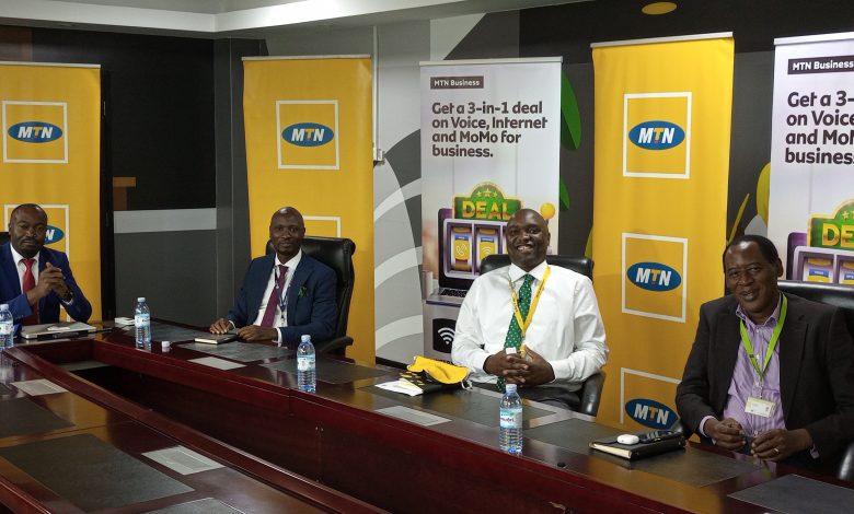 In Pic (right - left): Badru Ntege; CEO NFT Consult Group, Stephen Segujja; Head Enterprise Banking at Stanbic Bank Uganda, Ibrahim Ssenyonga; MTN Business General Manager and Charles Bwogi during an MTN Live Chat before launching the 3-in-1 offer.
