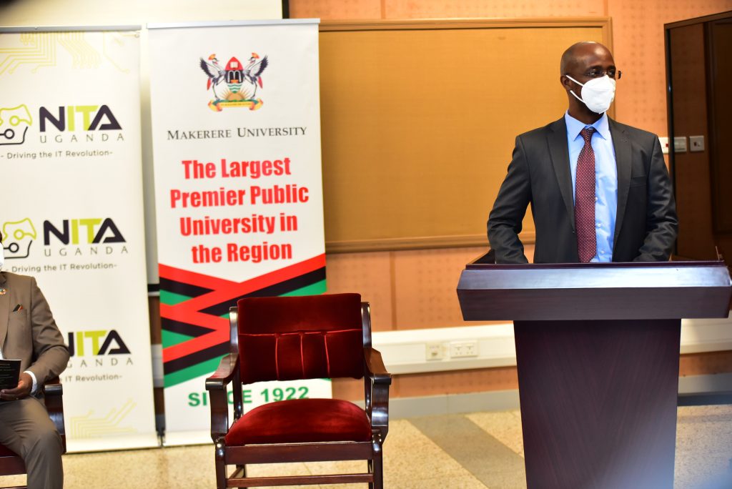  NITA-U Executive Director Dr. Hatwib Mugasa speaking at the hand over of IT equipment to Makerere University.