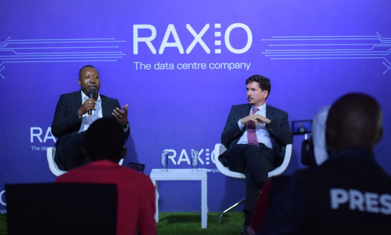 James Byaruhanga, Raxio Uganda General Manager (left) and Raxio Group CEO, Mr. Robert Mullins (right) speaking to the press at the launch of Raxio Uganda data center in Namave Industrial and Business Park. (PHOTO: Raxio)