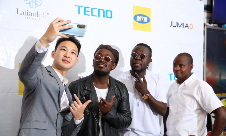 Timmy Shen, TECNO brand manager takes a selfie with Ugandan celebrities during the launch of the Camon 17 at Century Cinema at Acacia avenue in Kampala. (PHOTO BY: Tecno)