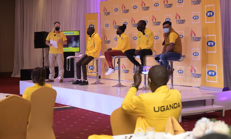 Wim Vanhelleputte (far left-standing), the Chief Executive Officer of MTN Uganda congratulates the Ugandan team that represented the country at the 2020 Olympic Games in Tokyo, Japan.