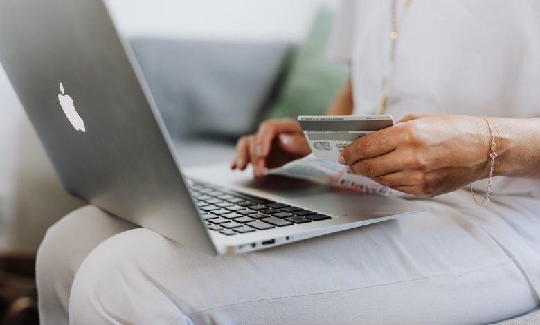 A customer pictured shopping online. (PHOTO: Karolina Grabowska/Pexels)