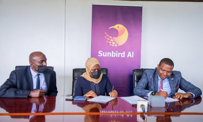 (L-R): Director Ernest Mwebaze, Dr. Aminah Zawedde, and His Worship Fabrice Brad Rulinda sign a Memorandum of Understanding to use Sunbird AI to curb noise pollution in Entebbe.