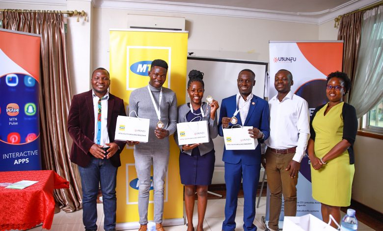 Some of the youth who participated in the Youth Skilling Program pose for a group photo alongside the MTN Uganda staff. (COURTESY PHOTO/FILE PHOTO)
