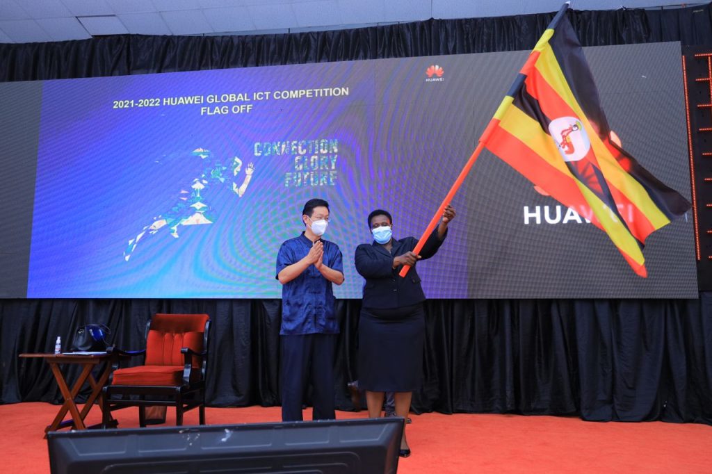 The Chinese Ambassador to Uganda Mr. Zhang Lizhong looks on as H.E Maj (rtd) Jessica Alupo flags off the Makerere University students who emerged winners in the Huawei ICT African Competition for the gobal finals in China on June 18th, 2022.