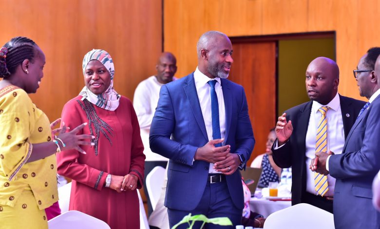 Ps. Ministry of ICT and National Guidance; Dr. Aminah Zawedde (2nd left), Chris Lukolyo; Digital Country Lead at UNCDF (c), Peter Kahiigi; Centenary Technology Services CTO (2nd right) and other guests share a light moment after announcing Cente-Tech and UNCDF partnership.