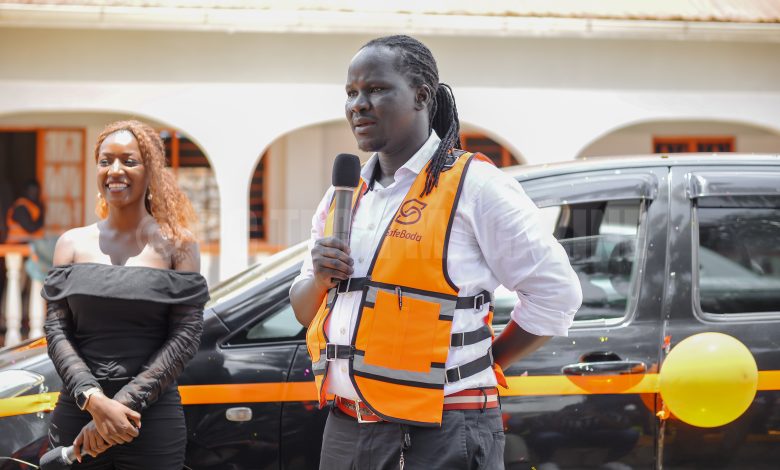 Rapa Ricky Thomson, the SafeBoda co-founder, and director speaking to the press during the launch of SafeCars, a car-hailing service added to the SafeBoda app. (PHOTO: PC Tech Magazine)