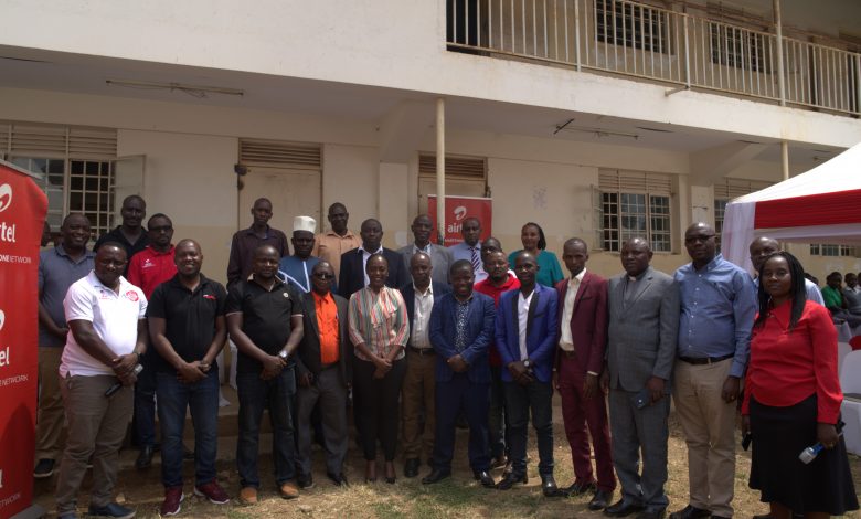 (L-R): Faith Bugonzi (5th L), Brand Strategy Manager at Airtel Uganda poses for a group photo with some of the Head Teachers of the selected schools connected under the Airtel Uganda campaign of Connecting 60 Schools to the internet with the aim of increasing access to digital learning.