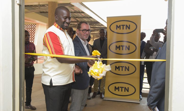 MTN Uganda Head of Commercial Andrew Tusubira and Enabel's Digital for Developemt Expert Bart Cornille launches the ICT Lab at UTC, Kyema in Masindi District.
