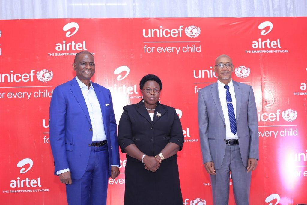 Munir Safieldin (2nd L); UNICEF Representative to Uganda, Segun Ogusanya (C); Airtel Africa CEO, and Joyce Moriku Kaducu (R); Minister of State for Primary Education pose for a group photo after addressing press on their commitment to accelerate access to education in Uganda and the rest of Africa, through digital learning. PHOTO: Airtel Uganda