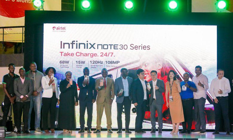 The Kampala Lord Mayor, Erias Lukwago (7th from left) with Ali Balunywa (6th from left), Joweria Nabakka Zziwa (5th from left), David Birungi (8th from left), Len (6th from right), and other officials from Infinix, Airtel and partners pose for a group photo with the newly launched Infinix NOTE 30 at Skyz Hotel, Naguru. COURTESY PHOTO