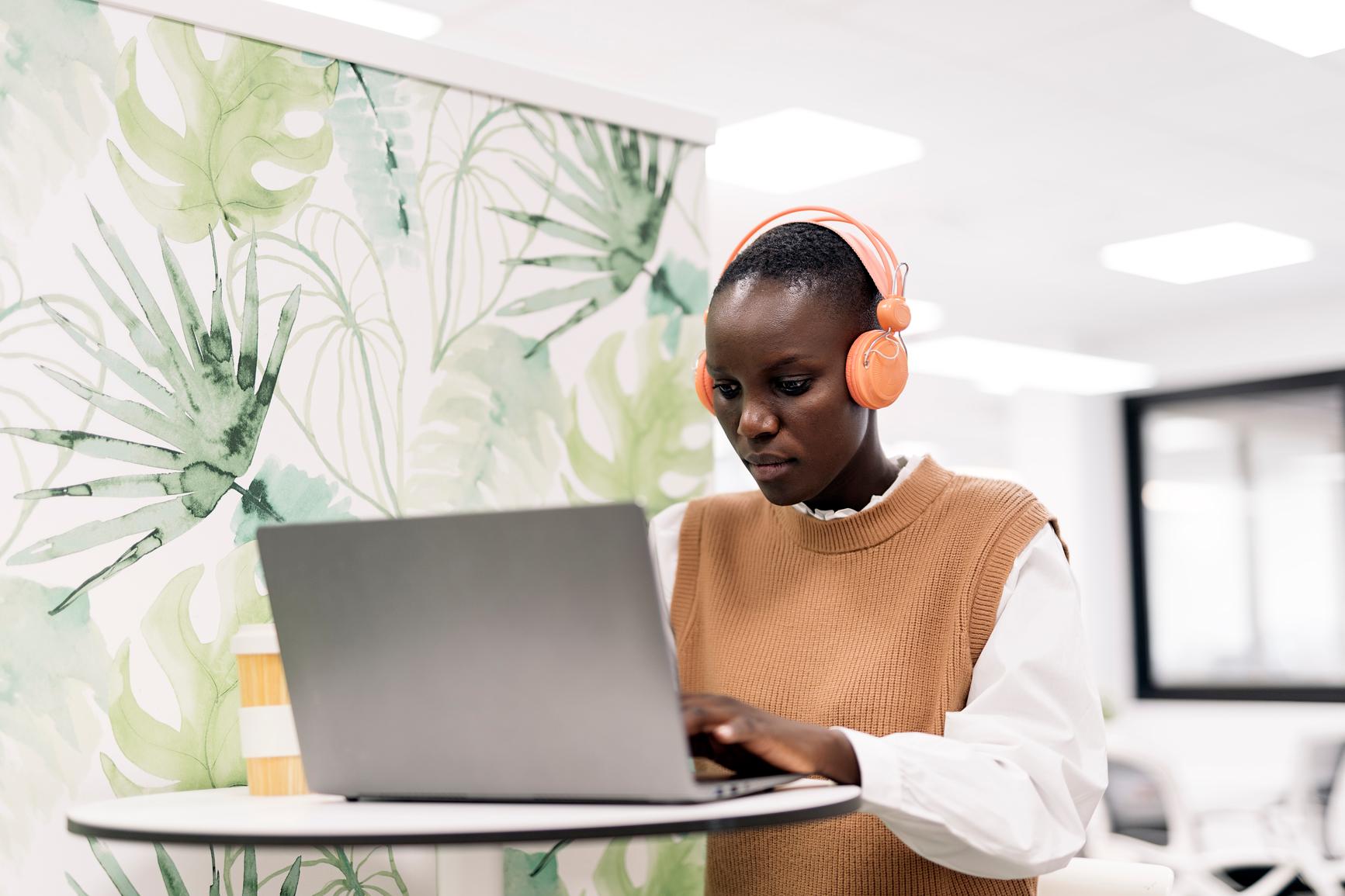 Black Business Woman Using Laptop Pc Tech Magazine